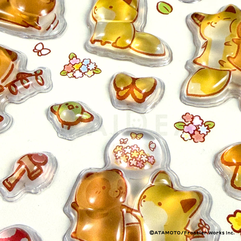 tanu_kitsu's tweet photo. 🛒 ✧˖° 𝖭𝖤𝖶 𝖨𝖳𝖤𝖬 ! ☞
「#タヌキとキツネ」
#ぷくぷくジェリーシール 
発売決定✨

ラインナップは3種類🌼

🍀 スタンダード
タヌキとキツネの仲良しな毎日をたっぷり詰め込んだ定番デザイン♪
見ているだけでほっこり癒やされます。

✏️ 手描き
やさしい色合いと手描きタッチが魅力。
絵本のような温かい雰囲気を楽しめるデザインです♪

🐾 ちびっこ
ちいさくなったタヌキとキツネがいっぱい！
くるくる変わる表情やしぐさがたまらなくかわいいデザインです♡

手帳やスマホケース、ノートのデコレーションにもおすすめ📖✨
タヌキとキツネののんびりやさしい世界を、ぜひお楽しみください🦊🍃

🔍販売に関する情報は 
【@ideacoltdtokyo】のアカウントをご確認く��さい。