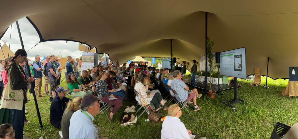 OrgResCent's tweet photo. And as if by magic those chairs have been filled! Nice #agroforestry starter session with Kinna Mosley and Ellen Smith. Packed to standing room only in the agroforestry tent showing how many people are still keen to learn about agroforestry. https://t.co/Gnq6kPiRlb