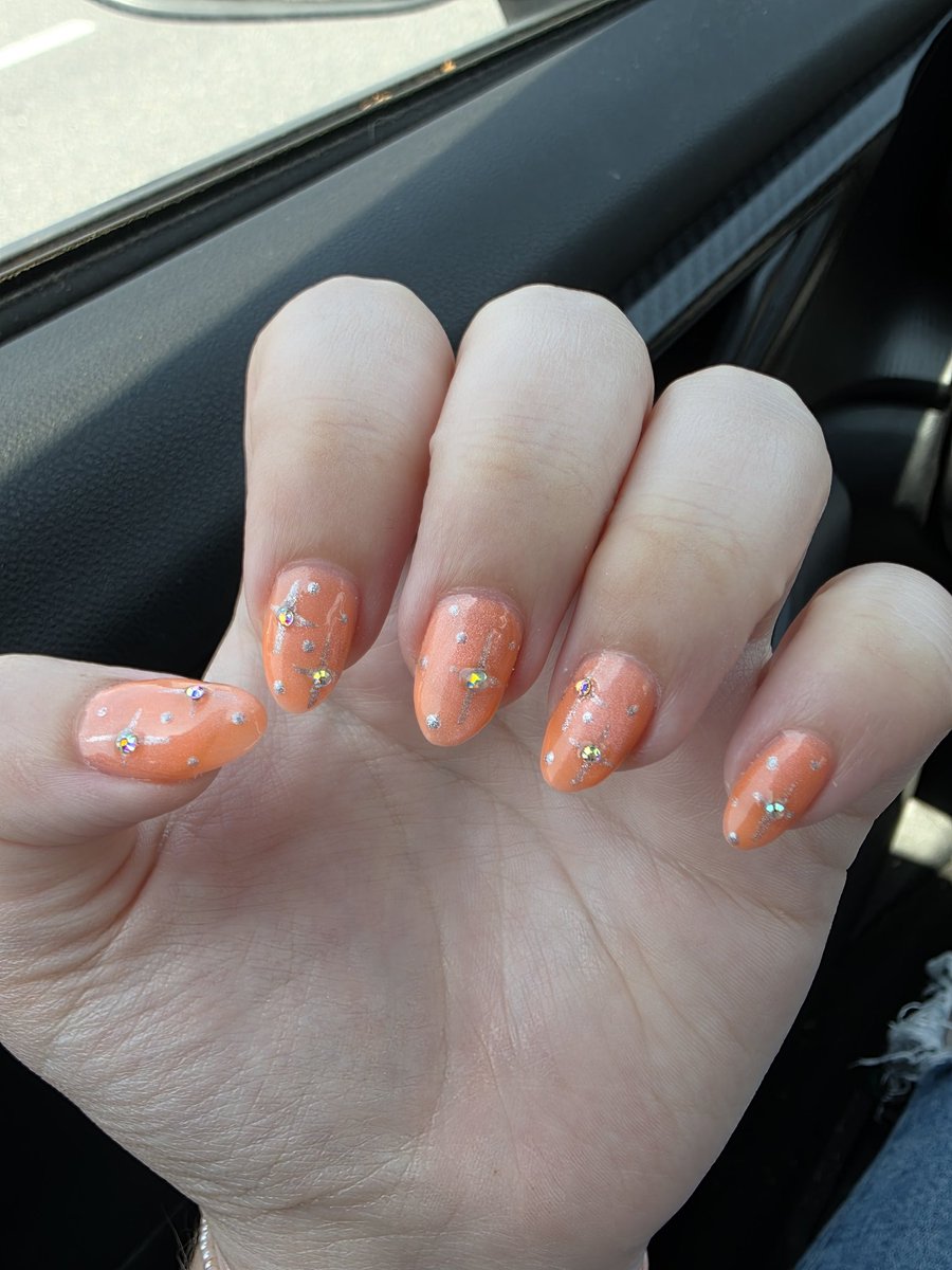 evillainist's tweet photo. i got gems on them for the first time and also got the cat eye polish, but it's hard to see the effect in the lighting in my car rn
i think they're really cute https://t.co/oiIwkw8Aw6