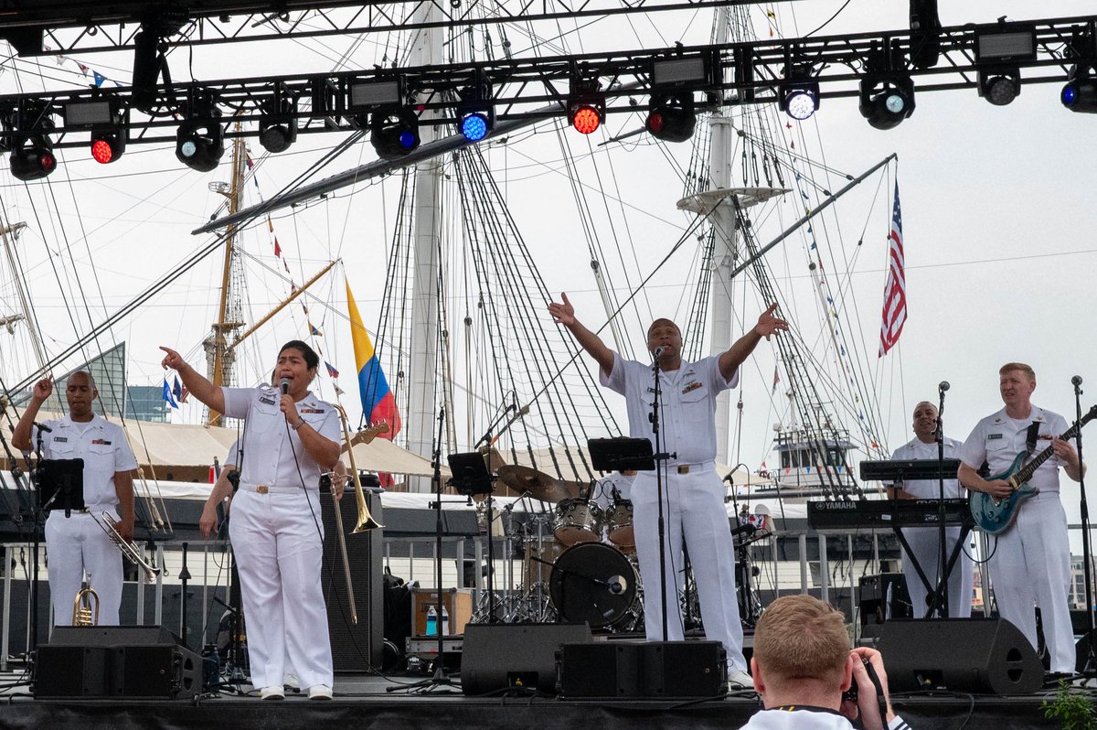 usnavyband's tweet photo. The U.S. Navy Band’s Popular Music Group, the Cruisers, brought high-energy entertainment to Baltimore’s Inner Harbor on June 27 during the Sail 250 celebration, connecting with audiences through music while celebrating our nation’s maritime legacy. #50for250 #navy250 #navymusic https://t.co/qigbJsRtho