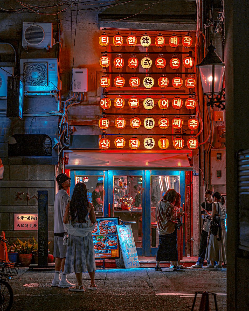 500px's tweet photo. From the neon-drenched glow of hidden back alleys to the cinematic rhythms of crowded city streets 🌃✨⁠
⁠
Photographer Spotlight: Masahiro Miyagi @masahira20066⁠
⁠
Masahiro Miyagi captures the layered, fast-paced energy of urban Japan with a distinctively cinematic eye. Choosing an 85mm f/1.4 lens over traditional wide angles, he utilizes a compression effect to pull distant billboards, glowing paper lanterns, and neon signs tight into the frame. His work isolates passing subjects with stunning, portrait-like clarity amidst the urban chaos.⁠
⁠
Masahiro strives to release the shutter the exact moment he feels an emotional spark, allowing his body and instincts to react before his brain can overthink a scene. While he embraces the sheer convenience of modern digital gear, he firmly believes that the true heart of street photography lies beyond technology, drawing constant inspiration from the raw, timeless emotion captured by early analog masters.⁠
⁠
Read the full interview on our blog: https://t.co/3kOkaXmtlt

#StreetPhotography #CinematicPhotography #TokyoStreetPhotography #UrbanPhotography #85mmStreetPhotography #500px