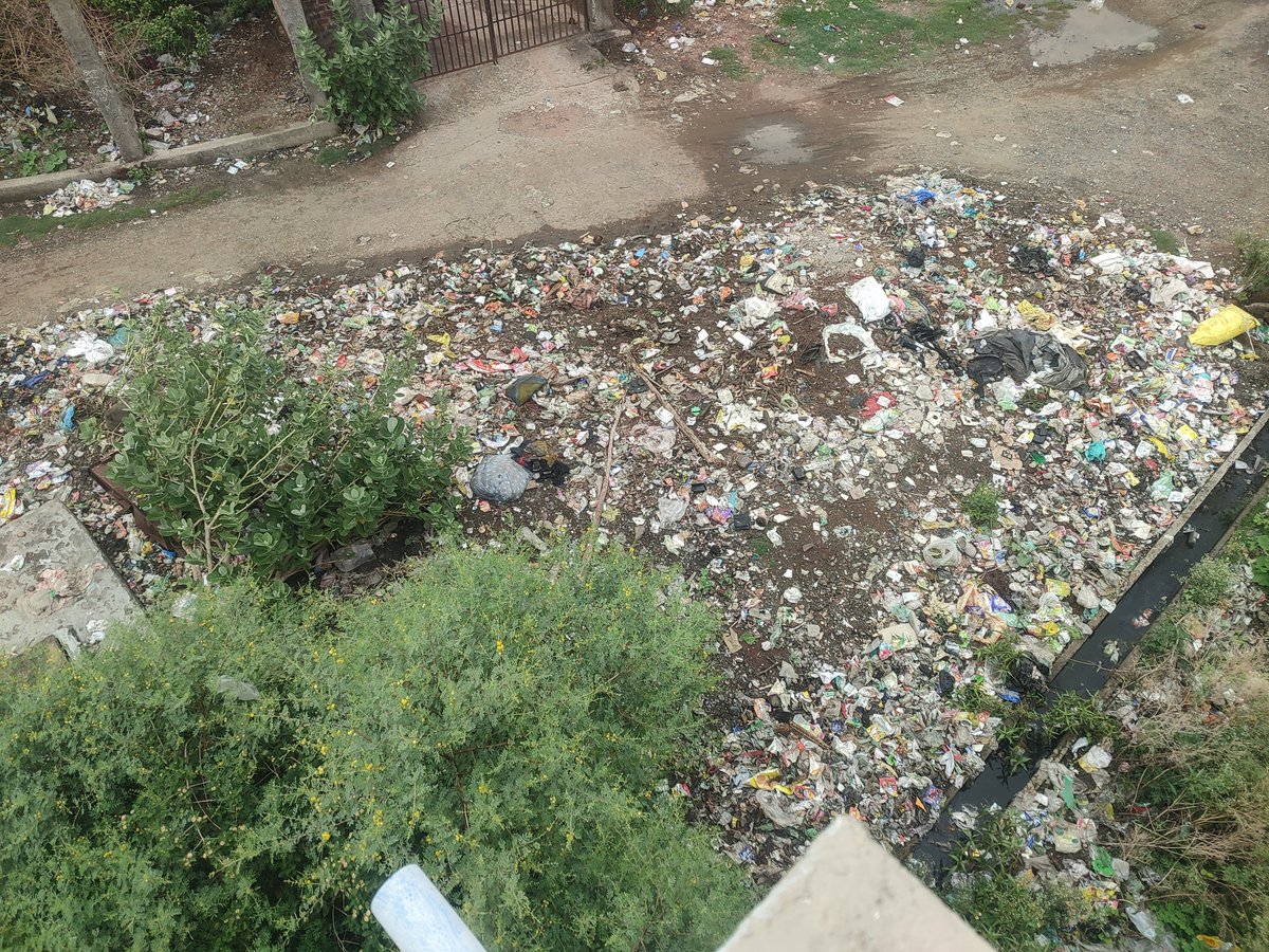 NotGiriraj's tweet photo. @BMCBhopal this is the condition of road in navibagh near maya enclave phase 3. I've called nagar nigam 2 times still it's not cleaned up. Unauthorized jhuggis have been established &amp; they throw trash here like it's their right. Is That what we receive after paying all our taxes? https://t.co/KSQlAn4cCx
