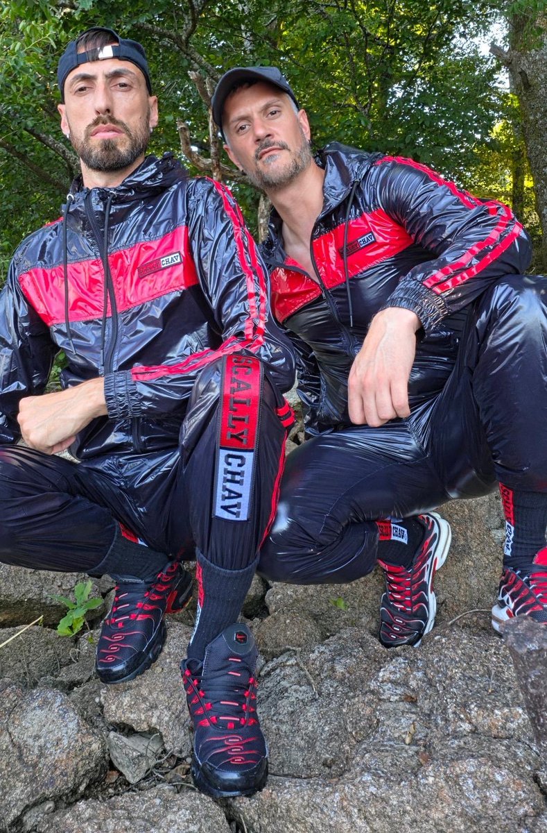 DanInBLN's tweet photo. These two guys Bryan and Adri are wearing insanely sexy @SCALLYCHAVGARMS black and red nylon tracksuits. They have even matching sock and super hot Nike Tn's. 
This is how I want my guys - looking good in damn hot gear. 
#scallyboy #chavlad #scallychav #nylontracksuit #shinynylon https://t.co/zFOBISmE9K