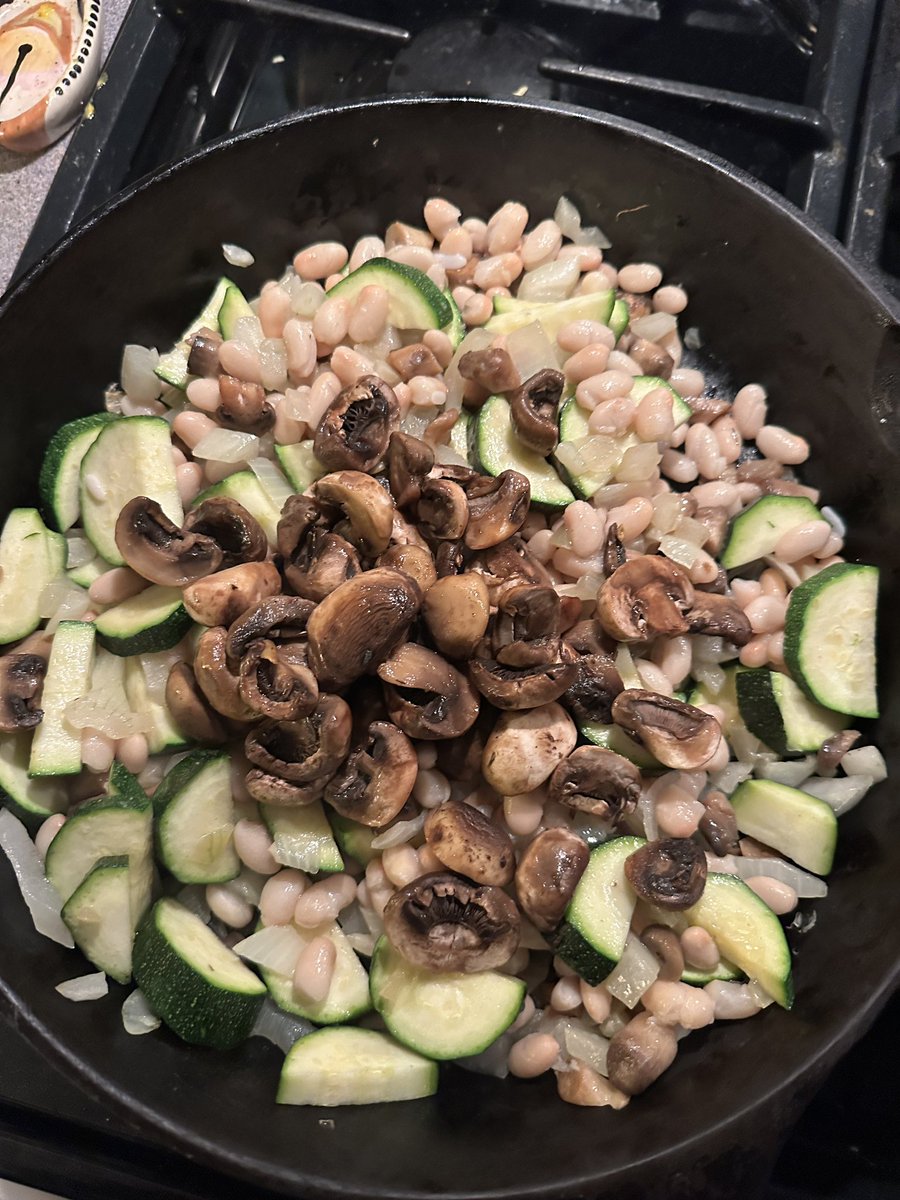 Autob0dy's tweet photo. New fav dish I'm adding to my week. Mushroom stem zucchini white bean with homemade walnut pesto over polenta. GOD dman https://t.co/xwBvOh4z9S