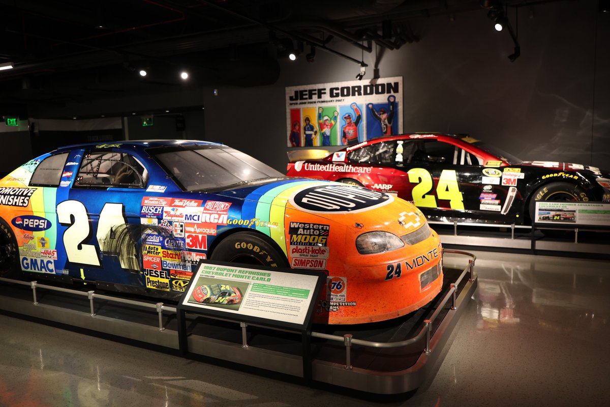 IMSMuseum's tweet photo. "Jeff Gordon" is now open! The new exhibition features 13 cars spanning every era of his career, never-before-displayed artifacts, and an art installation with more than 70 helmets. Open now through February 2027. https://t.co/Wt2AqK1EJf