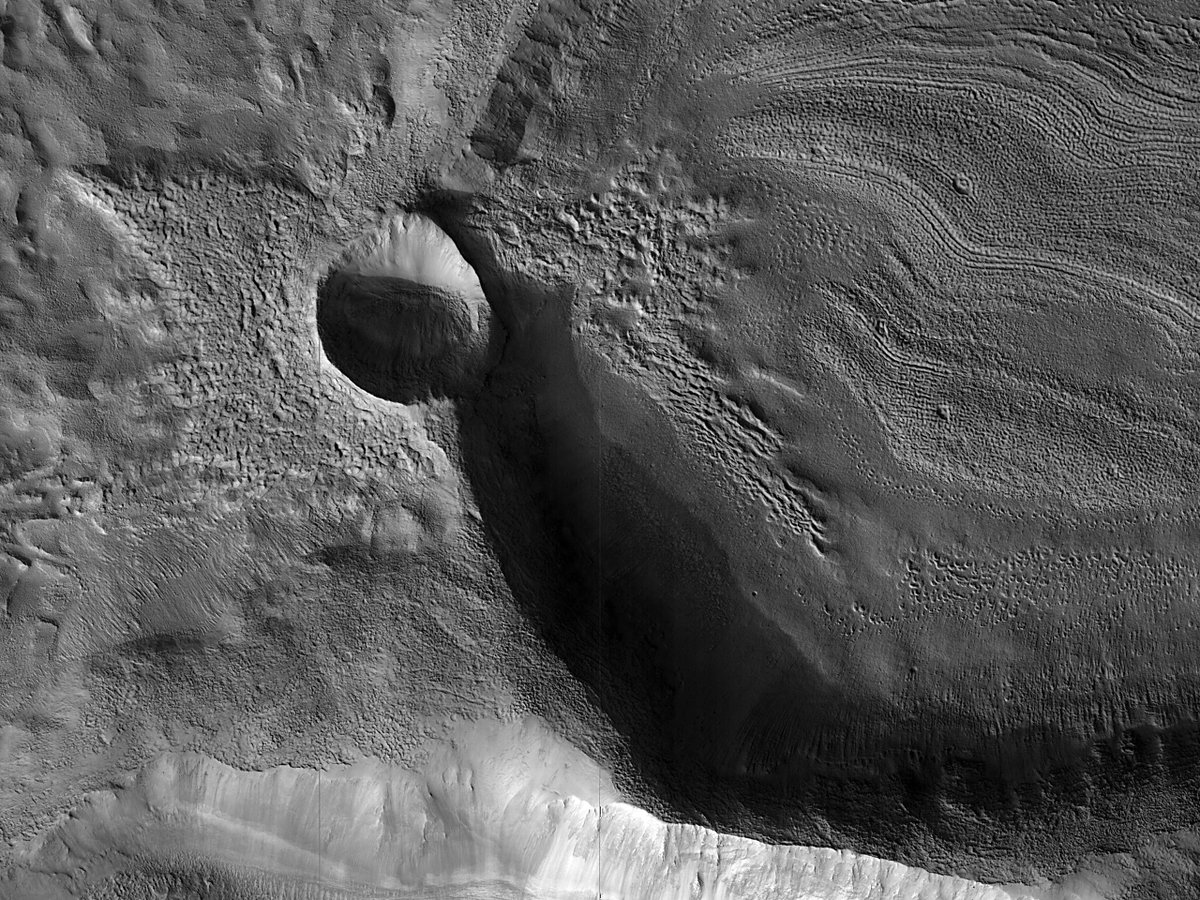 HiRISE's tweet photo. HiPOD: Eroding Ice-Rich Deposits in Two Craters in Arabia Terra

This image shows two craters with interesting texture patterns on their floors. These textures are indicative of the presence of ice-rich materials.

https://t.co/qnoVPHANTE
NASA/JPL-Caltech/University of Arizona https://t.co/R9PbRlVAC5