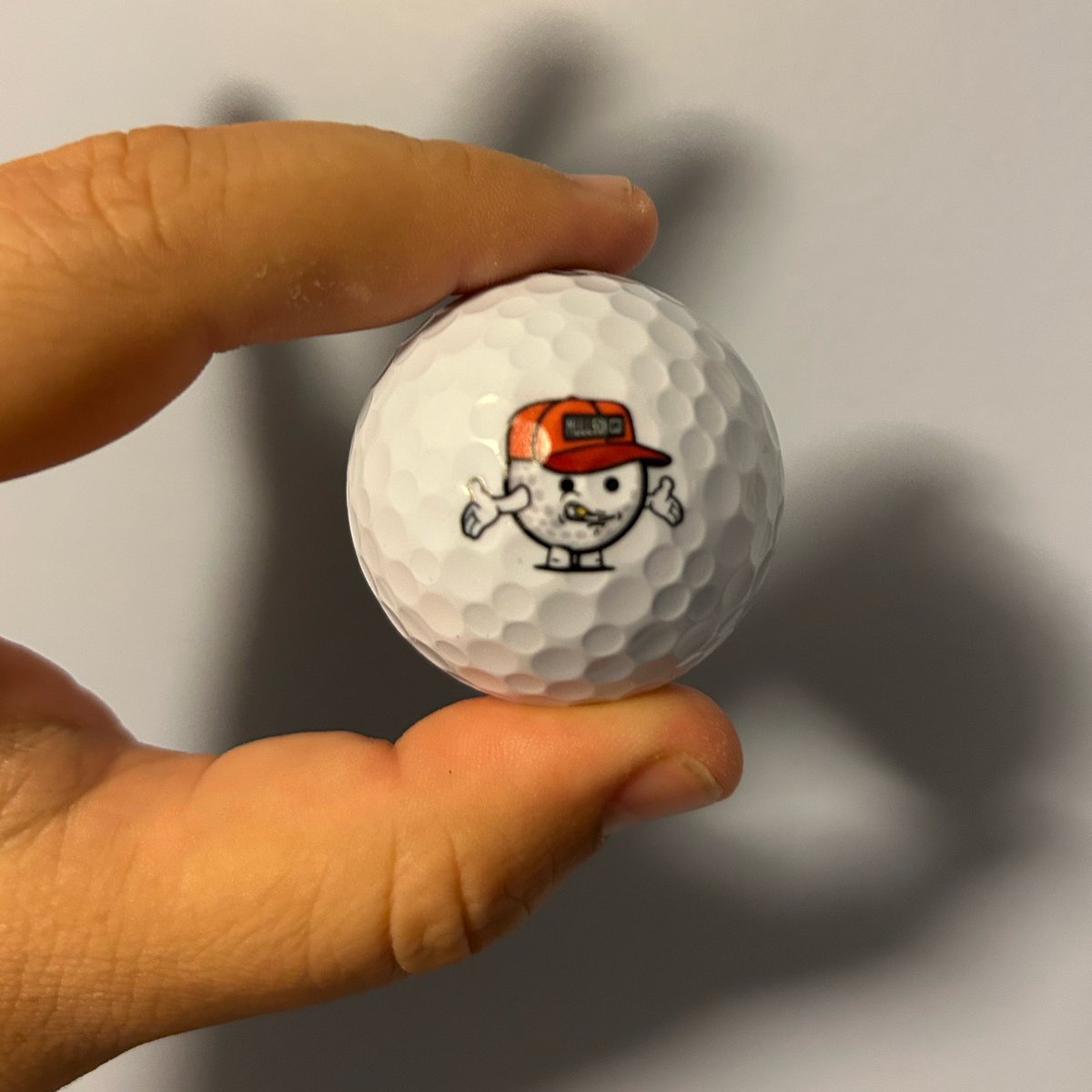 RisBrian's tweet photo. @burnt_the_troll @Mulls_On_Ape @opensea In addition to some new stickers and bag swag… I got these two new custom @Mulls_On_Ape Golf Balls … Hopefully every lost ball helps onboard someone new to the Collection! https://t.co/pqbnuNsaeb