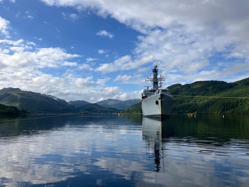 HMNBDevonport's tweet photo. HMS Sutherland in the serene surroundings of Loch Goil - she’s conducting trials as she gets ready for operations. https://t.co/4V41oekeMJ