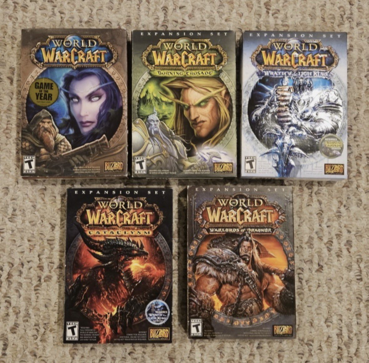 chrissyxchi's tweet photo. all this talk about playstation canning physical discs has me missing the world of warcraft game boxes https://t.co/JWJwW8M8aV