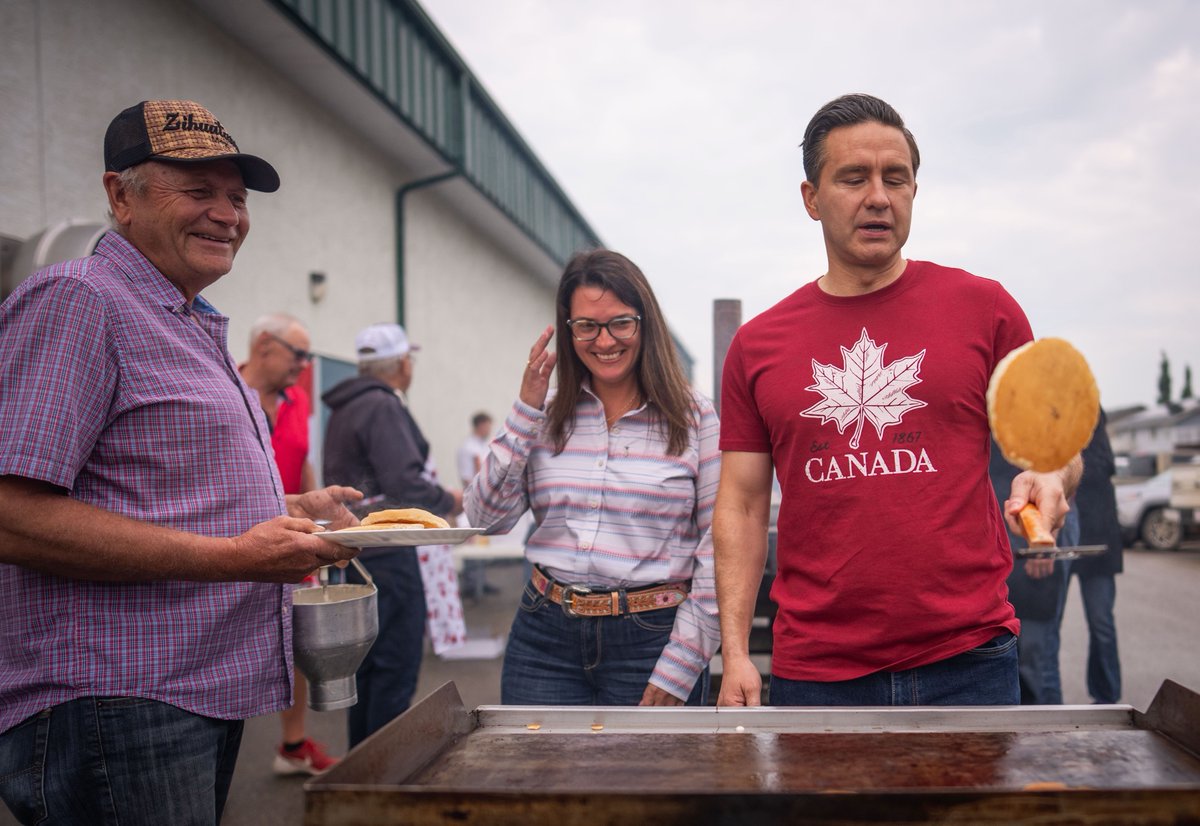 PierrePoilievre's tweet photo. Kicking off Canada Day festivities with the good people of Trochu, flipping pancakes and celebrating the country we love.

Happy Canada Day! 🇨🇦 https://t.co/UGDh8IkZLU
