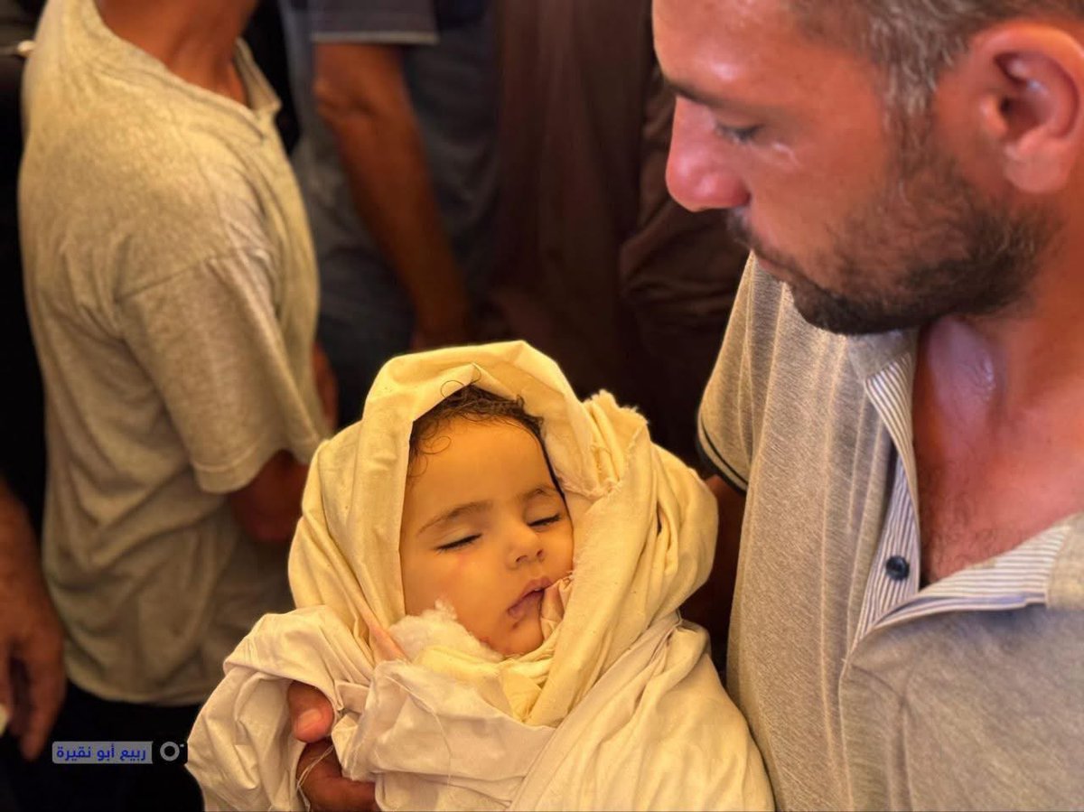 MosabAbuToha's tweet photo. This is the one-year-old baby whose open head everyone here watched.
I just found this photo of her before burial. Look at this innocent, beautiful face.
Does she not look like your children, your grandchildren, your nieces, your cousins?
What on earth are you doing to stop this? Isn’t it enough already?
What have you not seen yet? What are you waiting to see in order to take action and stop this? Stop your governments from support this g e nocide???