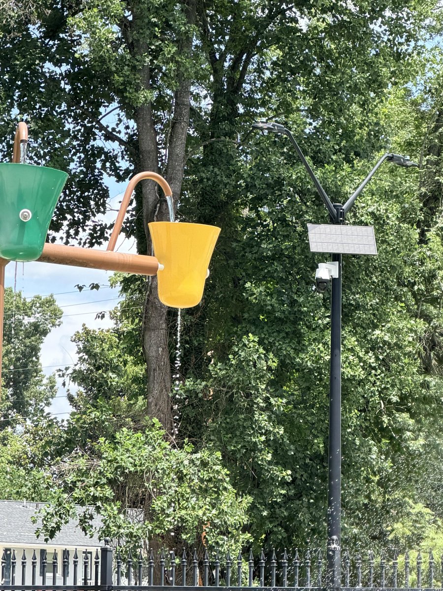 OrwellDay's tweet photo. Flock camera hanging above a community splash pad and playground overlooking kids at play, not facing the street. https://t.co/LbUXsZuHvI