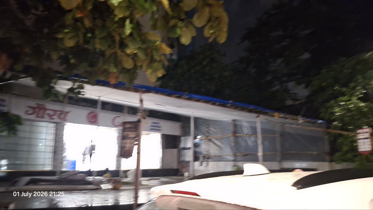 revati_3's tweet photo. #Illegal #construction #thane #Bramhand  aresident in Brahmand Phase 3, Thane, has raised concerns over alleged unauthorized construction and a 16-foot monsoon shed built adjacent to their terrace by a local  Sweets shop.
The complaints fiked with Thane Municipal Corporation and police citing safety risks to senior citizens, as detailed  accompanied by photographic evidence.
The public appeal on social media highlights ongoing civic challenges with illegal encroachments in urban residential areas during monsoon.