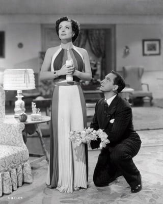 the_jess_who's tweet photo. I fell in love with this dress from a 1940 movie and went digging because I HAVE TO KNOW what colors were in the dress. But I read that it was lost to history so I’ll never know. 😭 https://t.co/3qPmpanLjC