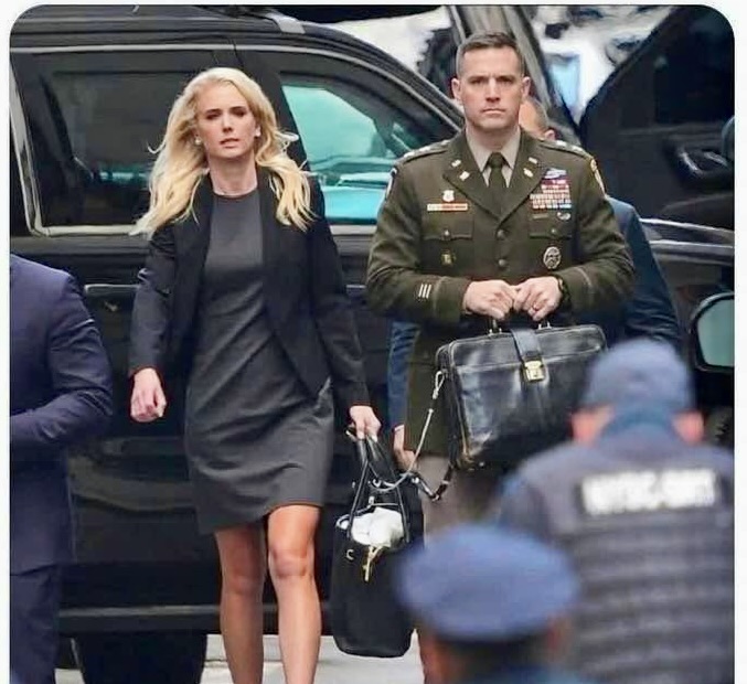 TheCardPlyr's tweet photo. This is quite the juxtaposition. The nuclear football and the DJT presidential diaper bag. The two most important bags in the world @realDonaldTrump @GavinNewsom @AOC @PeteButtigieg #pampers #poop #whatsthatsmell https://t.co/APdu3koc5s