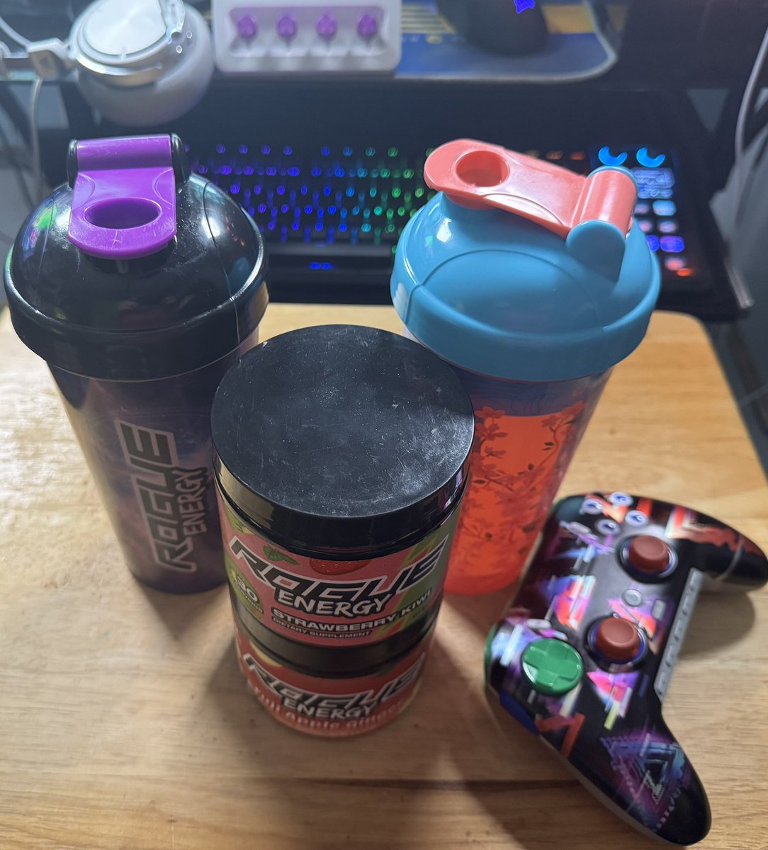 Magromancer's tweet photo. Tonight as I attempt to finish the YoRHa Alliance Raids in FF14 at https://t.co/WCyEQWGdDz I’m drinking Fuji Apple Ginger with Strawberry Kiwi from @TheRogueEnergy while playing with my custom @ScufGaming PC Controller and sitting in my FF14 @secretlabchairs STAY PAWESOME! https://t.co/Yh3fjmLmu4