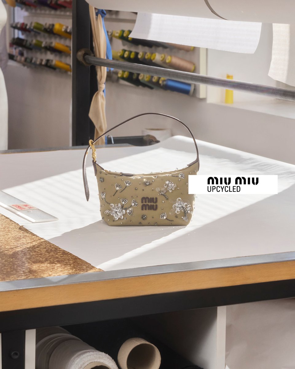 MIUMIUofficial's tweet photo. In Miu Miu Upcycled 2026 collection, vintage trousers are transformed into useful khaki pouches or backpacks, embroidered with signatures small crystal flowers. 
Discover the 2026 collection via https://t.co/usfjBStfWc and in selected stores worldwide.

#MiuMiuUpcycled #MiuMiu https://t.co/YCXfo1g339