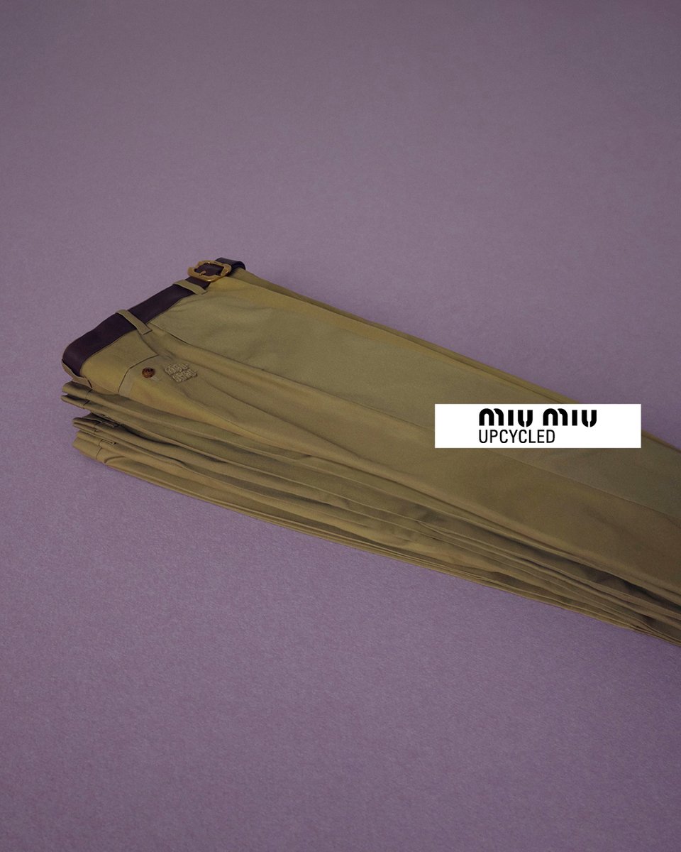 MIUMIUofficial's tweet photo. In Miu Miu Upcycled 2026 collection, vintage trousers are transformed into useful khaki pouches or backpacks, embroidered with signatures small crystal flowers. 
Discover the 2026 collection via https://t.co/usfjBStfWc and in selected stores worldwide.

#MiuMiuUpcycled #MiuMiu https://t.co/YCXfo1g339
