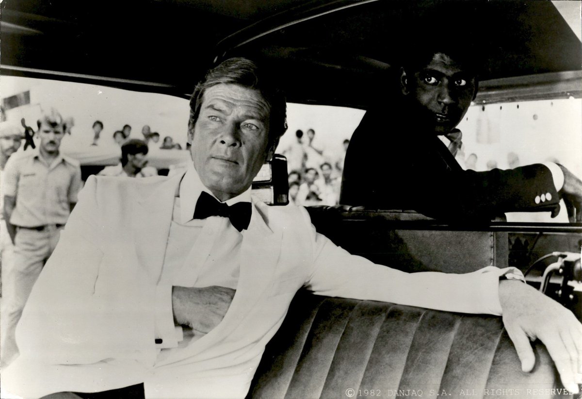 RogerMooreFan's tweet photo. Roger Moore and Vijay Amritraj during the production of Octopussy. https://t.co/6Vo2kA0ePA