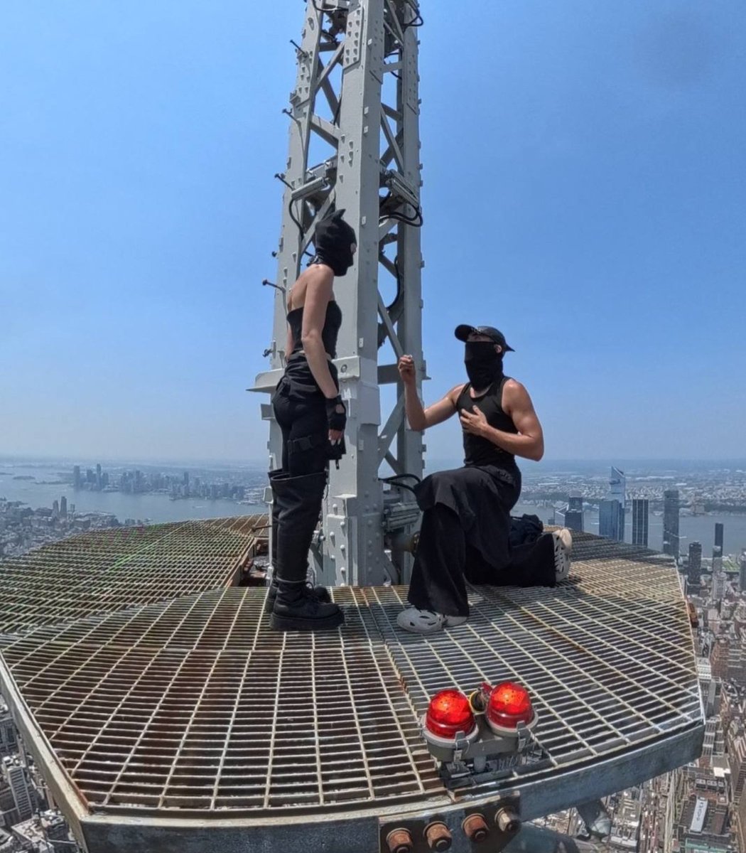 pubity's tweet photo. Angela Nikolau showed off her engagement ring after her boyfriend proposed to her atop the Empire State building.

They were both arrested a short time later for illegally climbing the building. https://t.co/kySzpWlg6Z