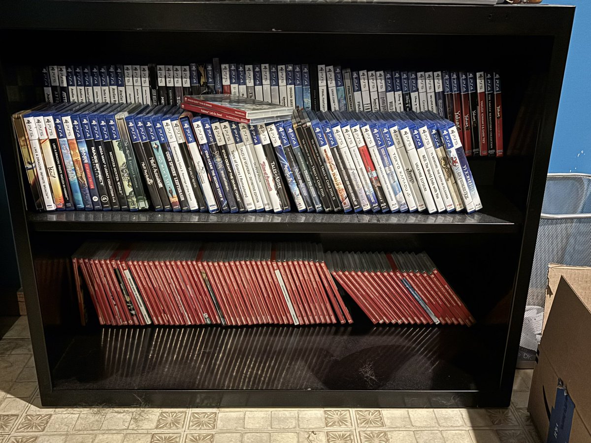 zhel's tweet photo. My ps4/5 and Switch 1&amp;2 collection, minus a couple that are hanging out in the other room with the consoles. Screw digital only. https://t.co/wTVNW2Gjof