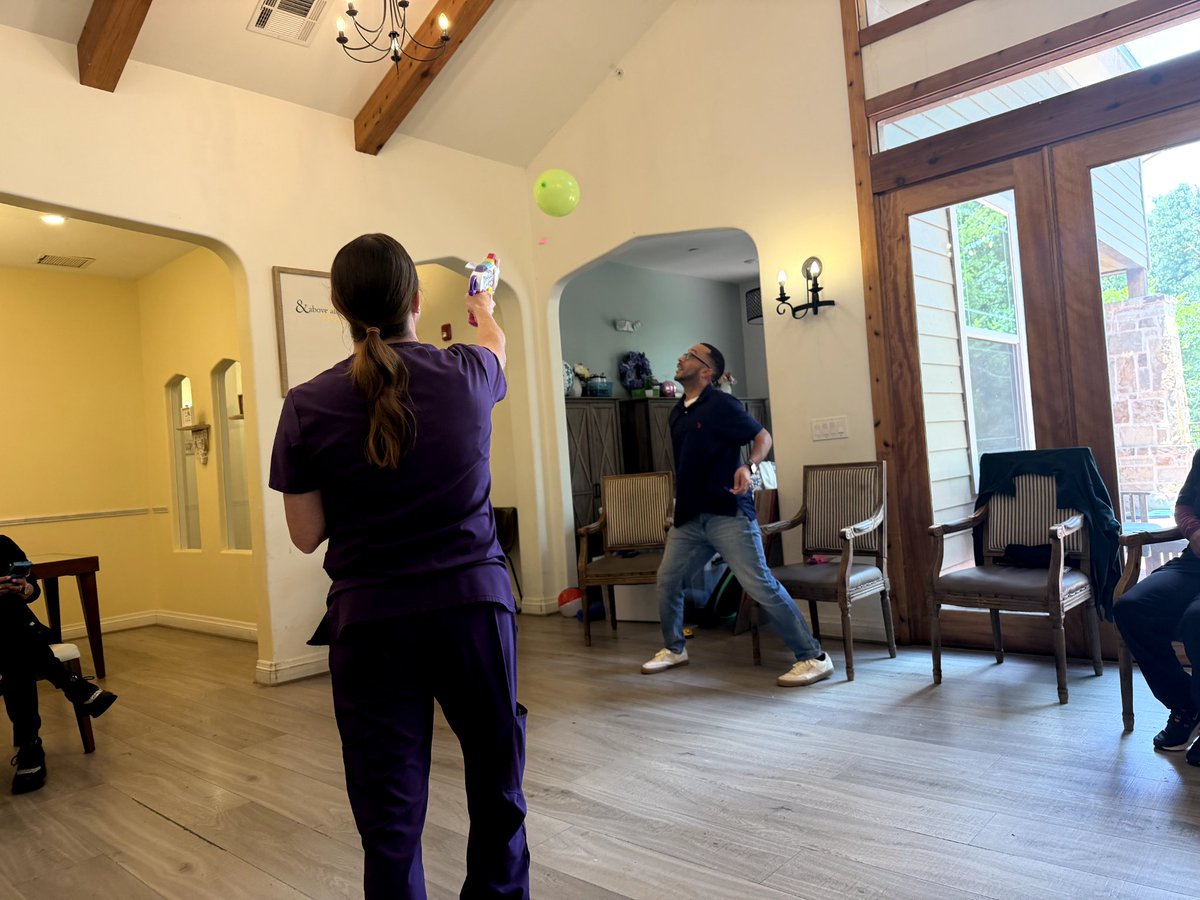RealYouRecess's tweet photo. At Village Green Memory Care, my Laugh Therapy Workshop was all about bringing out fun in the most ridiculous ways… like shooting balloons with a blastercorn nerf gun and watching the whole room turn into pure recess for adults! https://t.co/GYicF4mafe