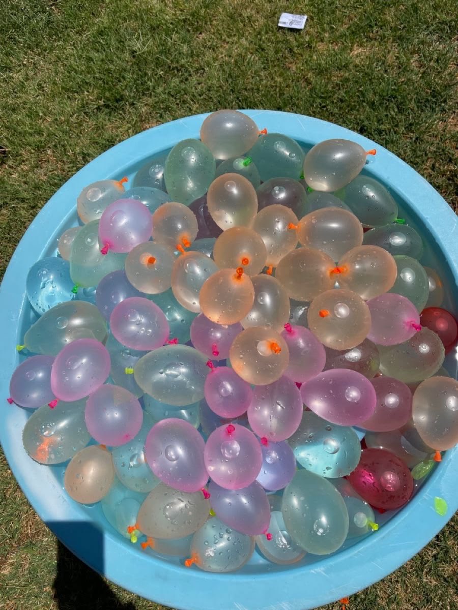 nillacub's tweet photo. —  sibs  that  beat  the  heat  by  playing  outdoor  water  games  .  .  older  sib  fills  the  water  balloons  while  younger  sib  tries  to  catch  all  of  the  fishies  ! https://t.co/vnM6wfI0Hv