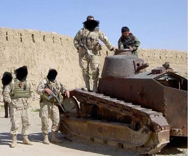ShitpostRock's tweet photo. Photo of US troops in 2005 posing with an original WW1 French FT-17 tank used by the French, given to the Poles during the Polish-Bolshevik War in 1920 that then got captured by the Soviets and sold to the Royal Afghan Army https://t.co/2QAhWWb5KI