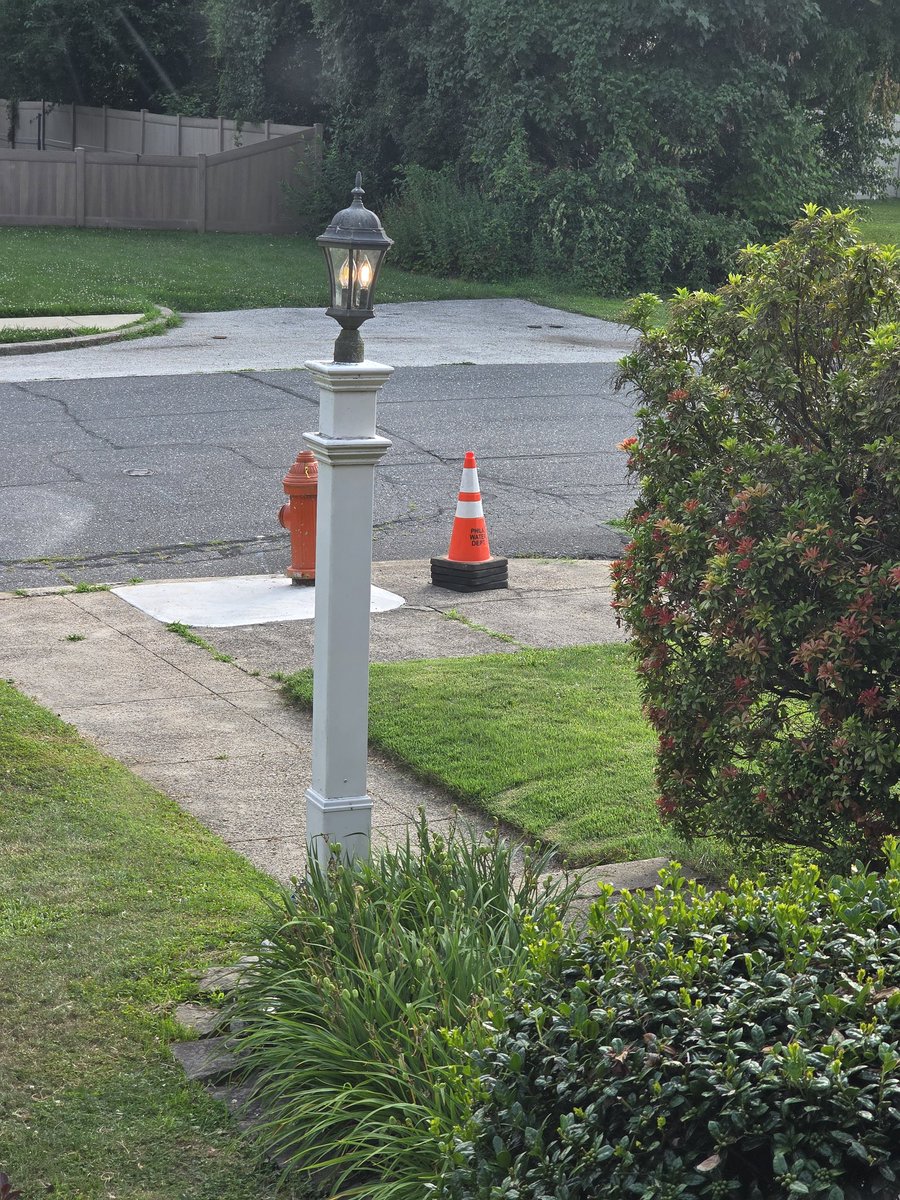Rootietoot2's tweet photo. @Mrstanleycup Here's some of our tax dollars wasted. The Water Dept. came and redid the concrete at the hydrant a month ago. Left the cones. Cones are heavy as shit. Not cheap ones. Guess they're mine now https://t.co/VMj7qXofxq