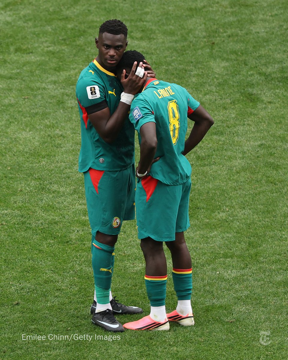 nytimes's tweet photo. From @TheAthleticFC: Utter devastation for Senegal's players, especially for Lamine Camara. He gave away the penalty that decided that match and sent his team out of the World Cup — he is in floods of tears on the pitch. https://t.co/te9Joop8Jr https://t.co/m8l9BpQRR7
