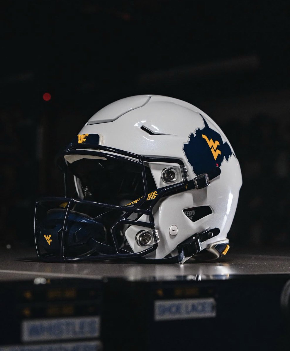UNISWAG's tweet photo. The gloss white lids for @WVUfootball 

#uniswag https://t.co/1AeP90qwoC