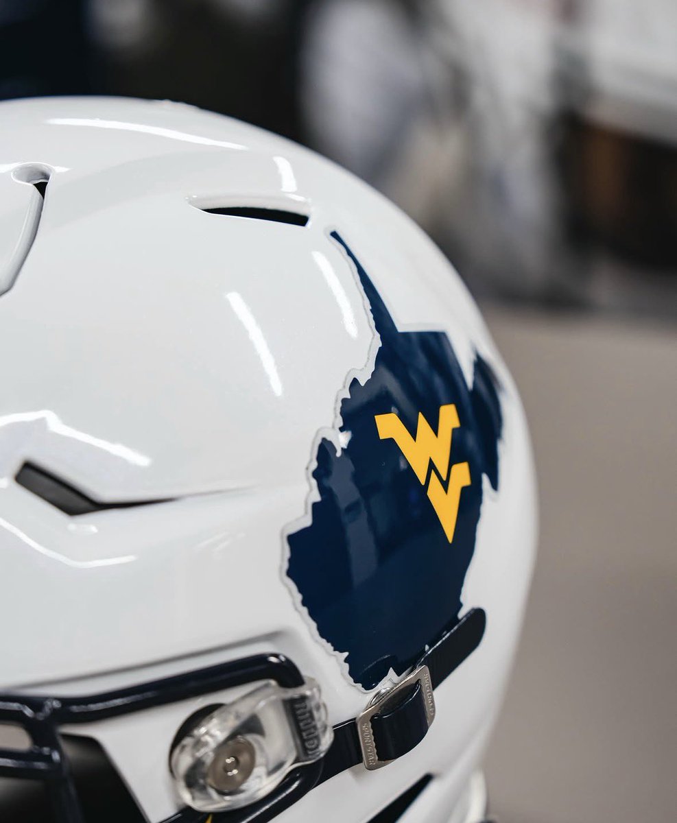 UNISWAG's tweet photo. The gloss white lids for @WVUfootball 

#uniswag https://t.co/1AeP90qwoC