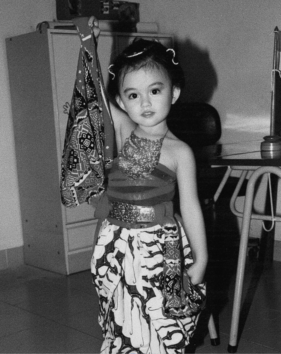insidefolkative's tweet photo. Agnez Mo posting foto masa kecilnya di hari ulang tahunnya yang ke-40 tahun,

"Today, July 1, 2026 is the day I can testify, that some victories don’t look like winning an argument. They look like refusing to become the thing that broke you... 
Ouf of the ashes, she rose. In the fire, she danced.

Some battles are within, not for everyone to see. This war ain’t for claps. It’s for setting me free. So yeah.I’ll struggle. I’ll rise. I’ll wrestle free.
 For the child, the self, and the in-between me.

Happy birthday 🎂🤍 to the little girl who kept believing before the world ever did. You did it. You really did it.