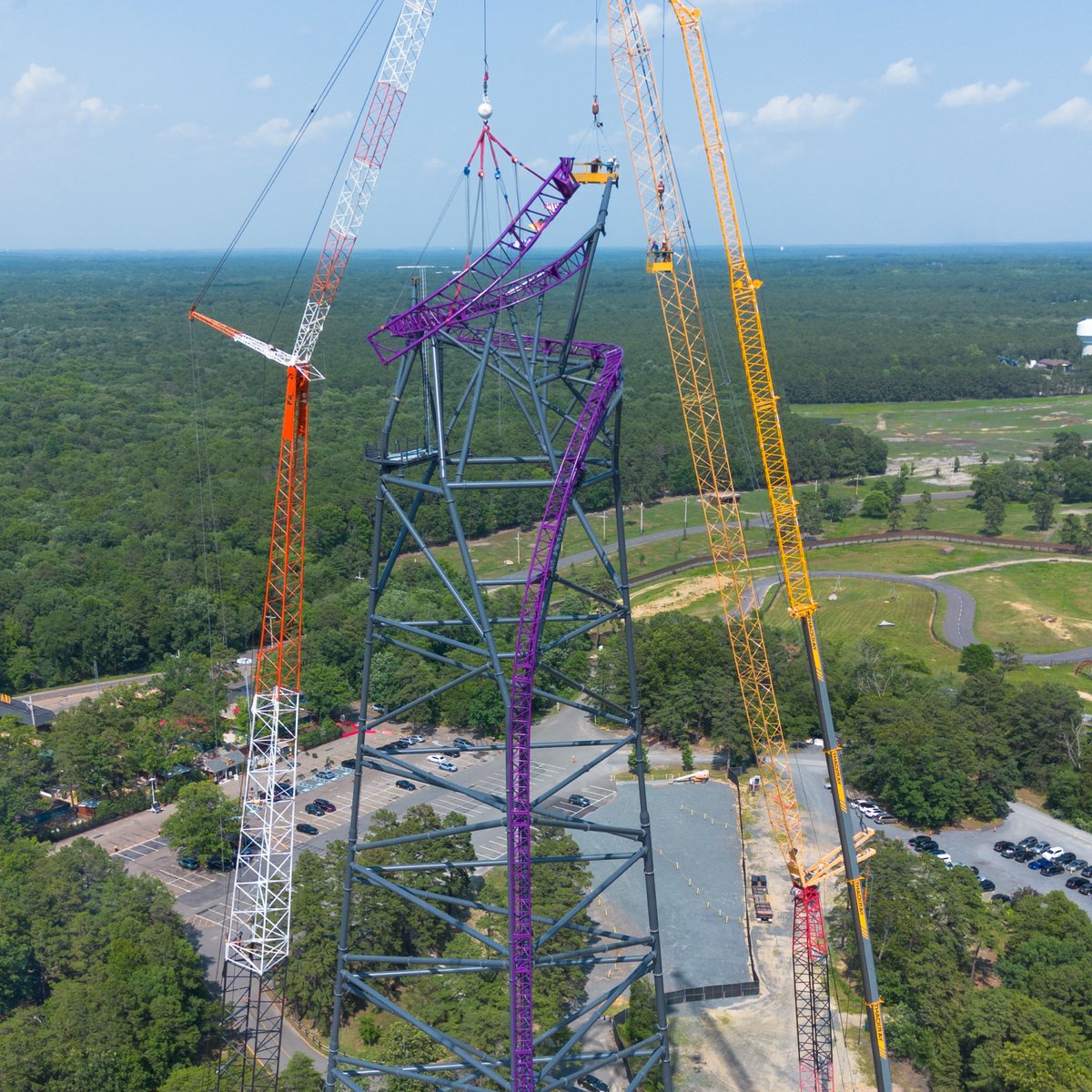 SFGrAdventure's tweet photo. A MAJOR milestone happened today… on the 52nd anniversary of Six Flags Great Adventure, we officially topped off #ProjectPurple! 💜

Soaring high above the skyline, take in these incredible views as we continue the countdown to 2027 and the arrival of this world-class ride. https://t.co/TpKWU2Yp8S