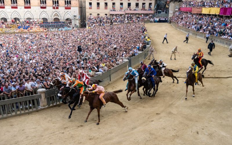 Spyros_Litsas's tweet photo. Today, 2nd of July, the first race of the #PaliodiSienna is taking place in #PiazzadelCampo. The #contrade together with the #Calcio_Fiorentino represent the most medieval representations today. One must certainly visit these at least once in lifetime https://t.co/2aBuR33ct6