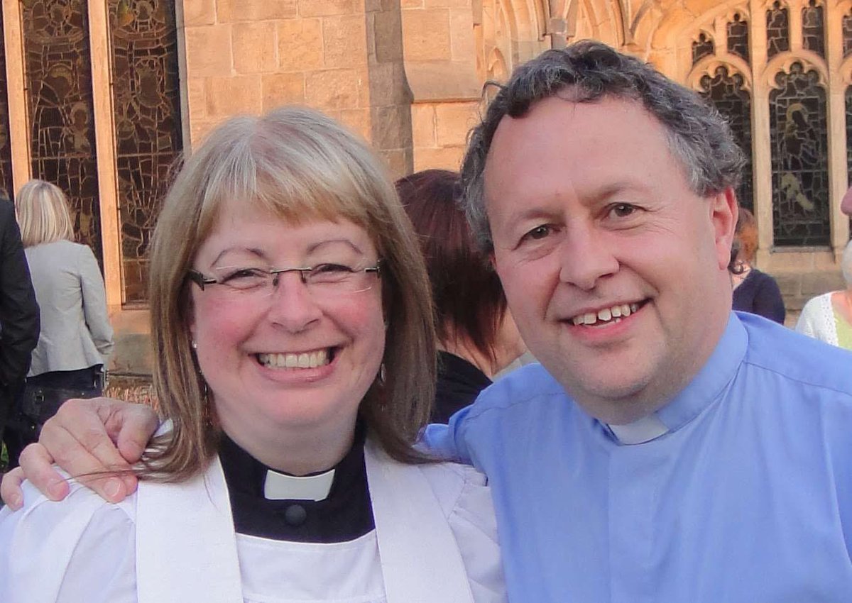 TheVicarageMeow's tweet photo. My mummy has been a priest for 15 years today (anniversary of being ordained as a deacon is on Saturday, July 4th). This is her and her training vicar, Derek. 💜💜💜💒

#catsontwitter #catsonX #Catsarefamily #catsofx #catsoftwitter https://t.co/MOL9JIEwIe