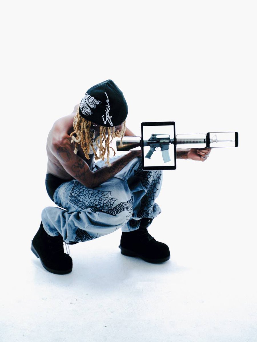 catalogging's tweet photo. OsamaSon for Spicie Brand Streetwear Drop (2026)

He is seen holding up 3 phones and a tablet which resembles a prop. https://t.co/ido7t4uLJQ