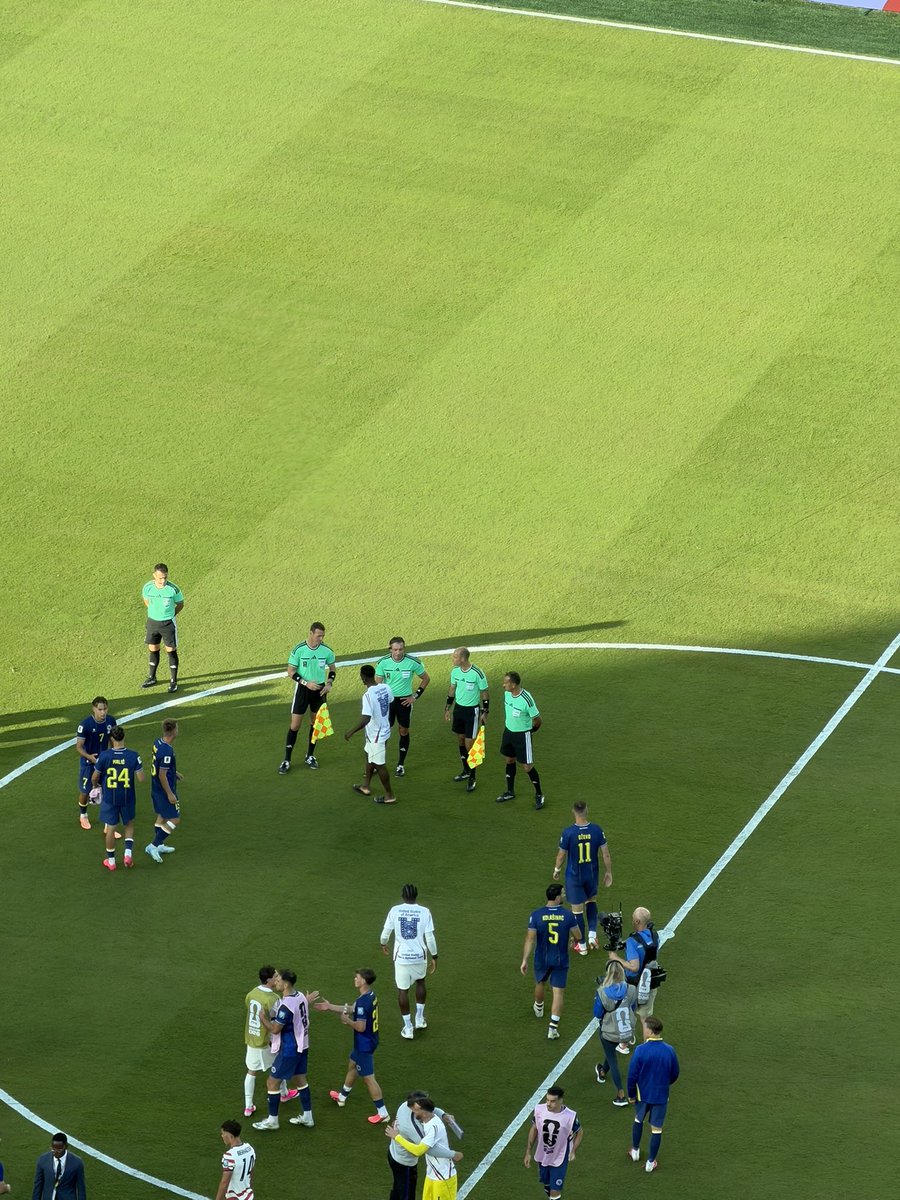 tombogert's tweet photo. Flo Balogun on the field with his USMNT teammates after the match and shook the hands of all referees. Didn’t linger or seem to protest. https://t.co/VXzlqjKz6l