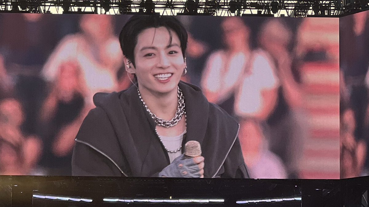 gimbapku's tweet photo. his pretty smile on the big screen https://t.co/kJYQARhTah