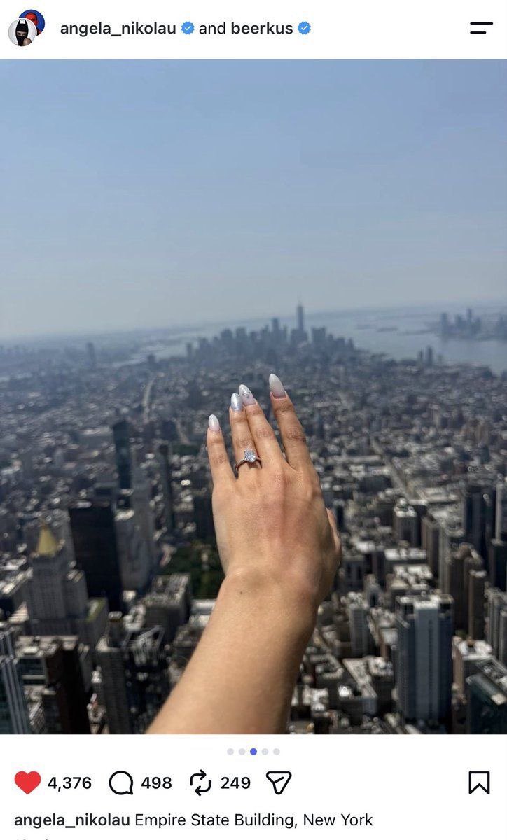 GargiRawat's tweet photo. Of all the crazy stunts! 
Two people climbed the Empire State Building and hung a banner from the antenna: “When the power of love beats the love of power, the world knows peace.” 
Then there was a proposal, and arrest. 
And she did this with perfect nails https://t.co/xiu1DFpTif