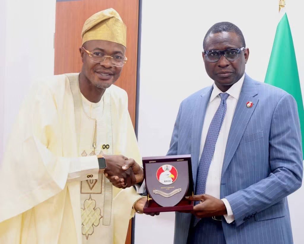 _Dejii's tweet photo. The Tinubu Administration wants Nigerians to believe that a “CON ARTIST” somehow forged a letter to appoint himself the DG of a “non existent” agency. This same guy somehow secured an office on the 2nd floor of the Federal Secretariat Complex hosting meetings with both foreigners and Nigerian citizens in the same building. 

This “con man” successfully opened 9 bank accounts in the names of his “fictitious” agencies including accounts in the CBN, misled the Accountant-General office and somehow snuck the budget of his “non existent” agency into the budget of the presidency. 

Guess what, this con man managed to deceive Sen. Adeola Olamilekan Yayi and Hon. Abubakar Kabir Abubakar’s Appropriations committees to appropriate over N1.3 billion to his fictitious agency. Mind you, this agency did not appear in the 2023, 2024, and even the 2025 but these seasoned lawmakers could not flag the sudden inclusion of this “non existent” agency and pushed it to the larger house for passage. 

This is where things gets even trickier, Bayo Onanuga says the great con artists, Prince Adeniyi was arrested on 27th October 2025, after  a petition by The Chief of Staff, on October 17, 2025, asking the DSS and the Police to probe the activities of ‘fraudsters and imposters’ forging appointment letters purportedly from his office.

This means that the presidency was aware of the Con man and his fake agency as far back as Oct. 2025. So how on earth did his “non existent” agency appear in the budget that the President presented to the joint house in Dec. 2025 and was subsequently signed into law in April 2026. 

After all of this, the Tinubu administration wants Nigerians to believe this man, Prince Adeniyi acted alone. A con man so connected he got a Police orderly. 

At this point I think The Tinubu Government might think Nigerians as f**ls.