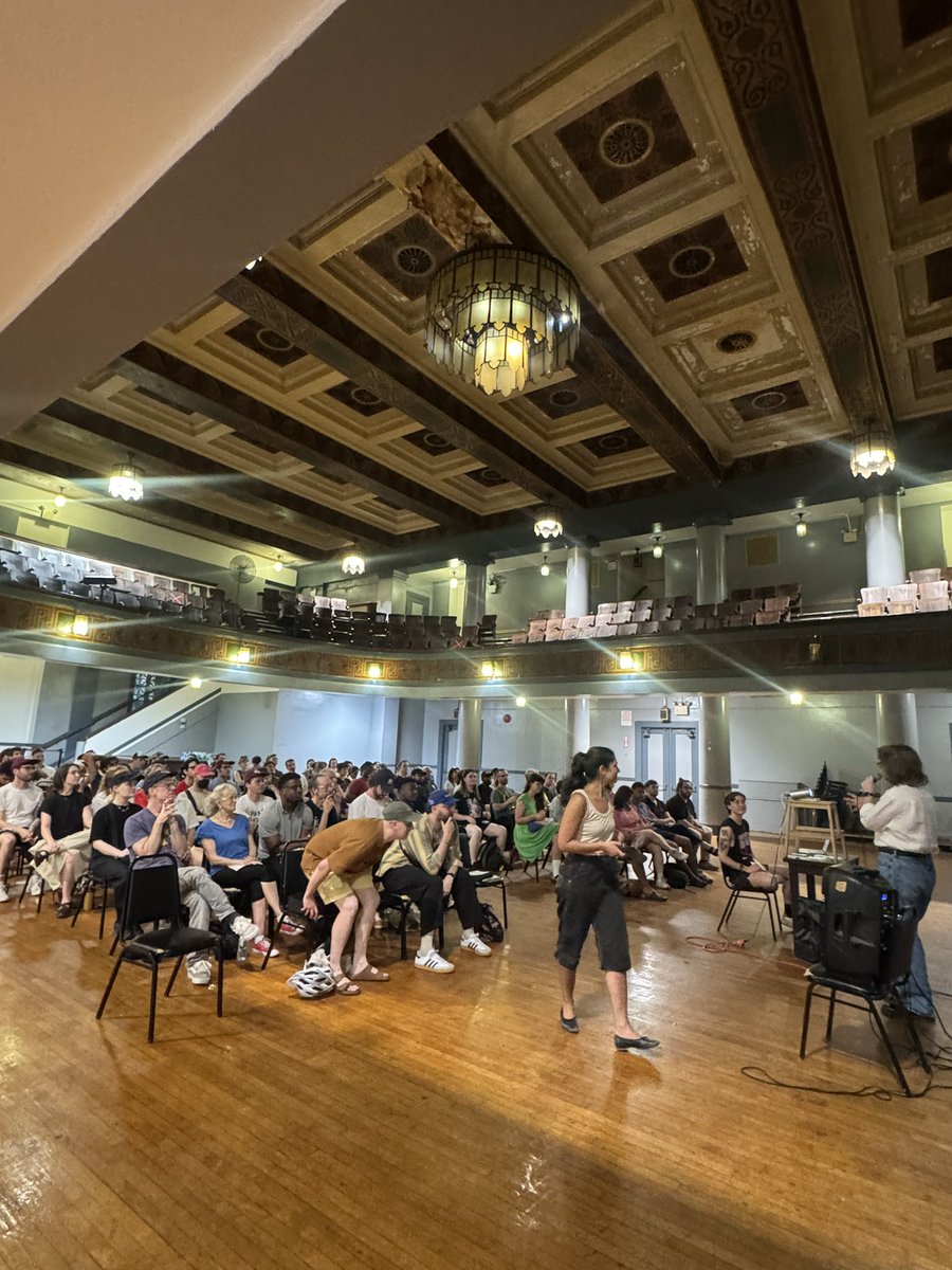 cbkDSA's tweet photo. they’re saying it’s a hot socialist summer #packedhouse 🌹 https://t.co/SQb17xOy5F