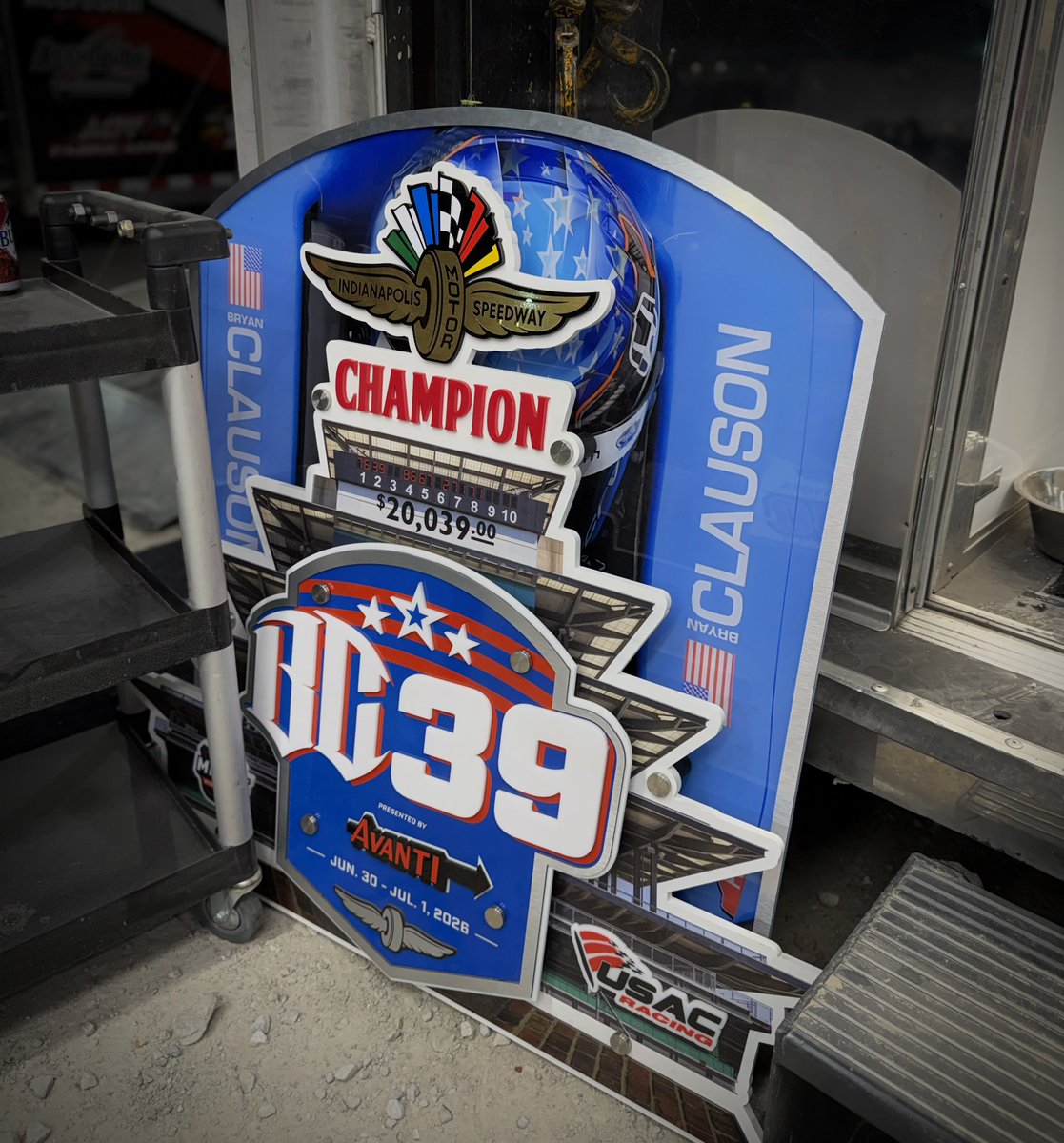 box3_racing's tweet photo. Bryan’s dad, Tim, called him “grasshopper.” A bright green one just so happens to be perched on top of the trophy in the @ChaseMcDermand/@briggsdanner78 pit. It’s been here for over an hour. 

We miss you, BC. 💚 https://t.co/NMC63c63Uw