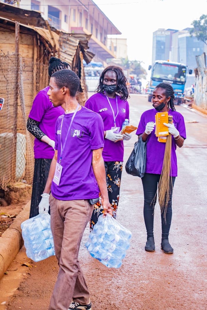 VAUorg's tweet photo. For World Vitiligo Day 2026, VAU hit the streets of Kampala. Bags of water for the team. Flyers for the people. Brooms for the dirt. Gloves on, hearts open.
We cleaned near Old Kampala Hospital. We swept by Kumar Supermarket. We came with more than brooms. We came with truth. https://t.co/kkZP76brDu