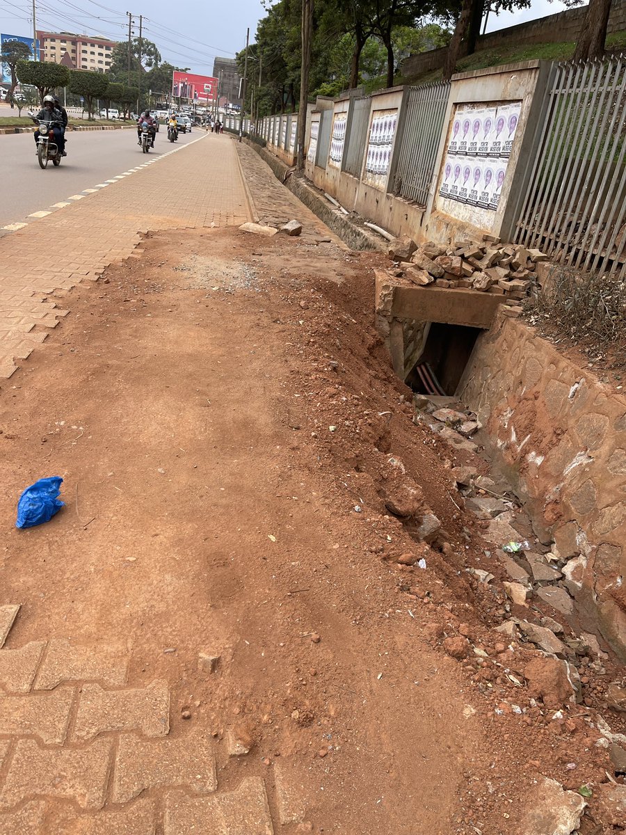 innoe84's tweet photo. @KCCAED @Buzeki_Sharifah @nwscug Please kindly kindly help. It’s getting to a month now. This is just before shell mulago. This is the mess left by @nwscug after repairing a broken pipe. They don’t return the pavers. Kindly help. https://t.co/GU75O2KIfm