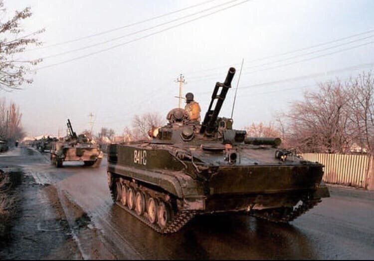 saturn74954's tweet photo. A column of Russian BMP-3 IFVs in Mozdok, 12 January 2000.

Photo by Mark H. Milstein. https://t.co/z2okilGwea