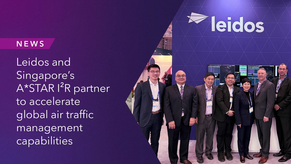 Seven professionals (6 men, 1 woman) in business attire stand smiling before a Leidos logo and multiple data screens. Left text reads: NEWS, Leidos and Singapore's A*STAR I\u00B2R partner to accelerate global air traffic management capabilities.