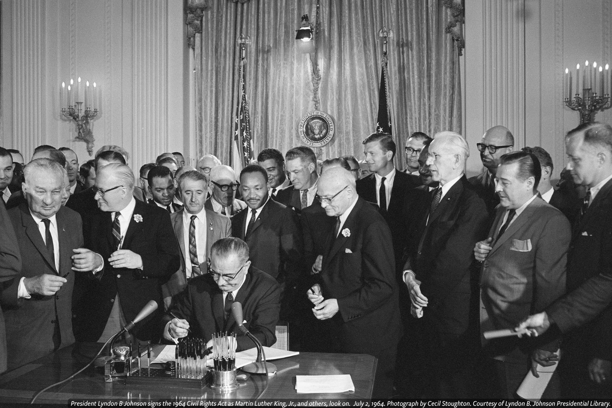 NMAAHC's tweet photo. #OnThisDay, The Civil Rights Act of 1964 was signed into law. The law gave the federal government a new role in desegregating schools and other public facilities. #ANationsStory #APeoplesJourney https://t.co/KDSkYzvYV1