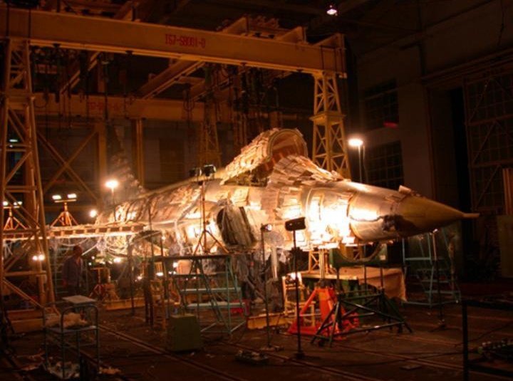 miragev3ff's tweet photo. Joint Fighter programme (FC-1/JF-17) undergoing static structural tests at AVIC.  The hundreds of small rectangular pads covering the fuselage, wings, and tail are tension patches (load pads). https://t.co/1G3VVtBDA4
