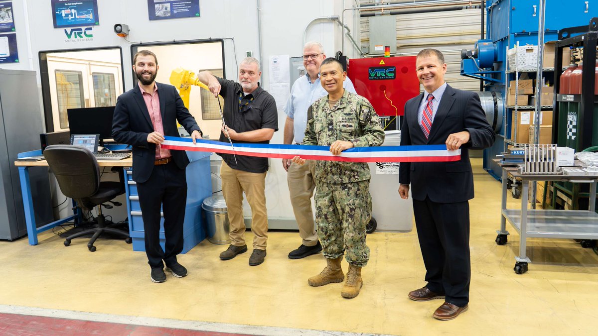 NAVSEACrane's tweet photo. Ribbon cutting complete! ✂️ NSWC Crane officially opened the Metal Additive Manufacturing (MADMAN) Repair Center. Using advanced cold spray tech, we are now repairing critical maritime &amp; aerospace components in days instead of months. 

#NSWCCrane #FleetReadiness https://t.co/eBAskeLCFc
